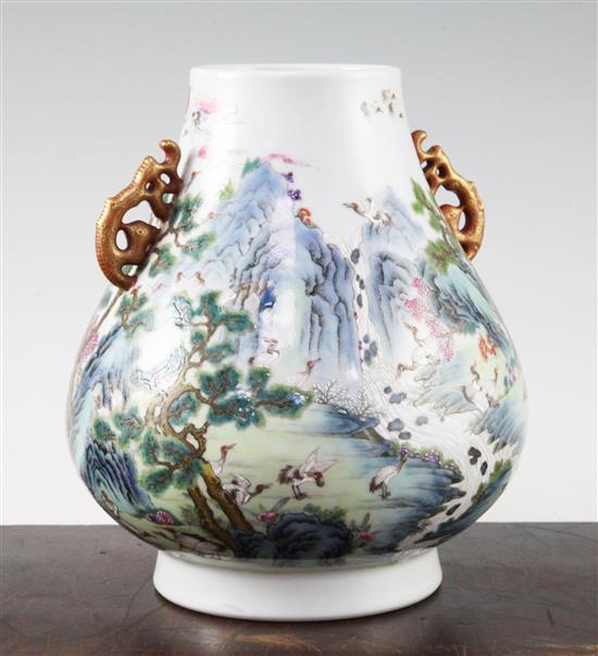 A Chinese famille verte pear shaped vase, Hu, 21cm